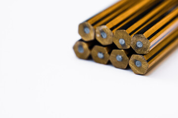 aligned pencil with white background, sign, up and down