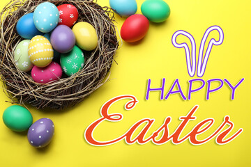 Happy Easter. Bright painted eggs in nest on yellow background, flat lay