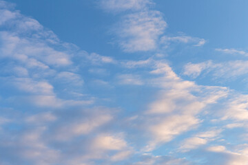 White clouds on a blue sky. Sky and clouds  as patterns background.