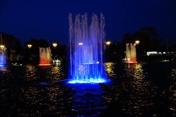 Color lighted fountains at night at Moscow's VDNKh center