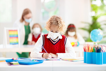 Kids in face mask. Child in school.
