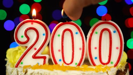 Number 200 Happy Birthday Cake With Burning Candles Topper.