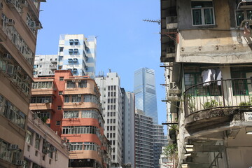 Fototapeta premium Modern Skyscrapers and Old Buildings in Kowloon, Hong Kong