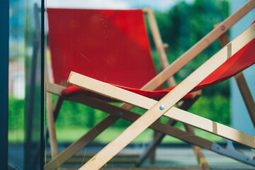 red wooden garden chairs