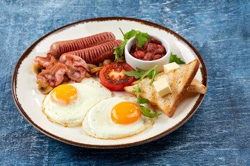 traditional breakfast with egg and sausages