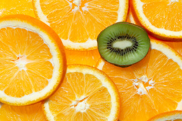 Citrus orange fruits slices and kiwi slice background