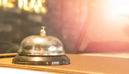 Concierge service desk counter with staff team working in front of hotel with tourist business customer.