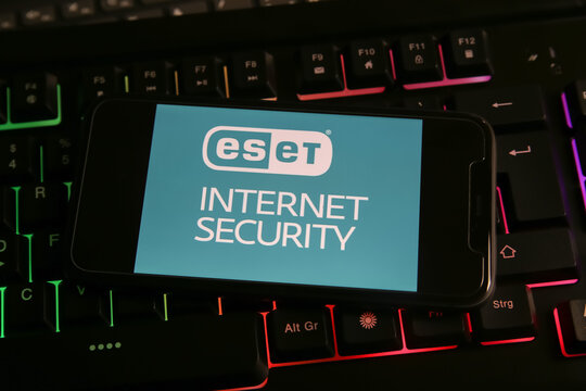 Viersen, Germany - March 1. 2021: Closeup of mobile phone with logo lettering of eset internet computer security software on keyboard