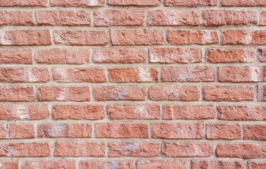 Obraz premium Simple hand made brick wall brickwork. High detailed brick wall.