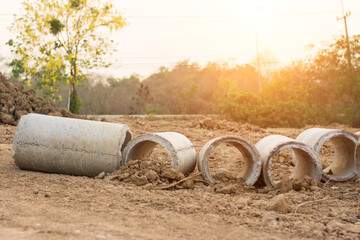 construction site and sunset,New construction site with crane and mechanical equipments on sunset background,