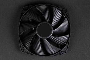 Computer fan on a black background close up