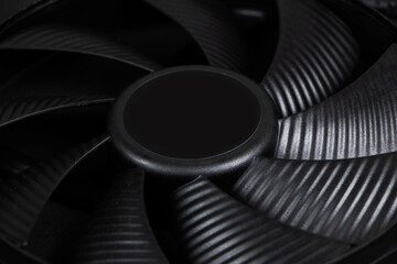 Computer fan on a black background close up