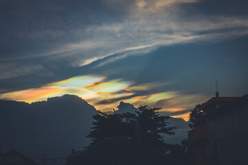 
A Rare Look at an Iridescent Cloud. fire rainbows or rainbow clouds. Iridescent Pileus Cloud colorful optical phenomenon sky