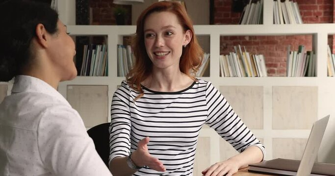 Manager making offer to Indian female client, customer decide to buy services of company businesspeople shake hands accomplish negotiations successfully express trust to further partnership concept