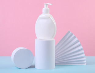 Beauty still life. Product presentation. Cream bottle and geometric shapes on a blue-pink pastel background. Minimalism, Concept art