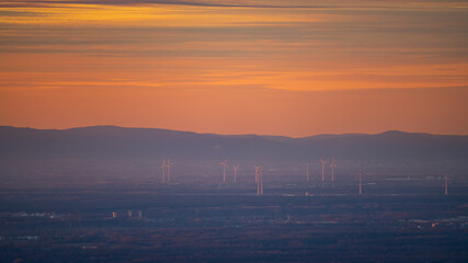 Wind farm in the colourful light of the evening sun