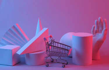 Geometric shapes and shopping trolley in red-blue gradient light. Surrealism. Concept art, retro...