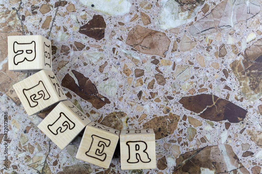Poster decorative refer concept design template with alphabet letters on wooden cubes arranged in a curve t