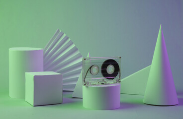 Retro audio cassette, geometric shapes in green purple gradient neon light. Surrealism. Concept...