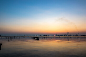 Evening water view from around Mare Piccolo, Taranto, Brindisi, Italy. The lovely colors of the...