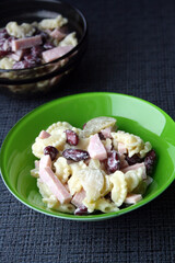Salad of pasta, ham, beans and pickled cucumbers. Belgian cuisine.