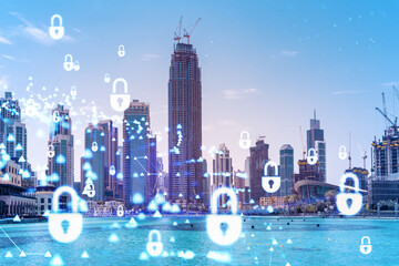 Skyscrapers of Dubai business downtown. International hub of trading and financial services. Lock...