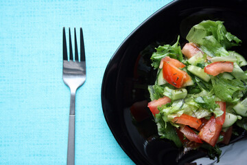 Salad of Frieze, tomatoes and cucumbers with olive oil.