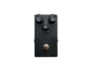 Isolated black sand texture overdrive and black knob stompbox electric guitar effect on white...