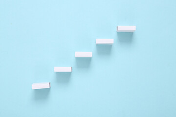 White steps on a blue background. Minimalism. Concept art.