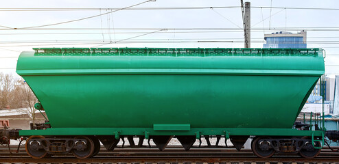Hopper wagon, freight railroad hopper car..Transportation grain cargo on railway. Railroad grain...