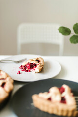 Cooking raw ingredients on white table, making cake.