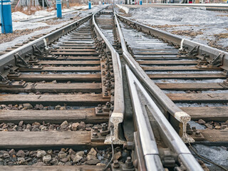 Frog (common crossing) of rails on the Trans-Siberian Railroad. Close-up.