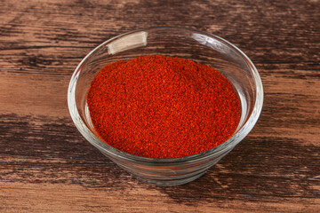 Dry paprika powder in the bowl