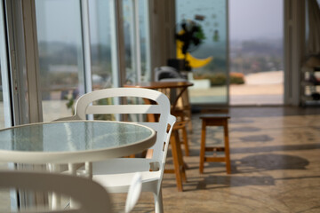 White chairs and round table in the cafe For customers
