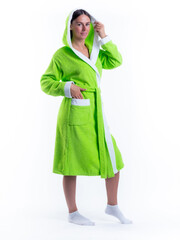 woman in a Bathrobe on an isolated white background with a smile on her face.