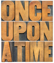 once upon a time opening phrase - storytelling concept - isolated word abstract in vintage letterpress wood type