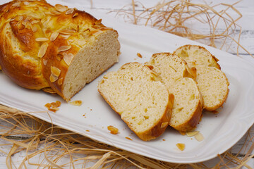 plaited yeast bun-pastry on vintage table