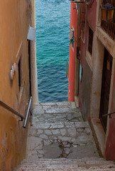 Old stone stairs and passage to the sea