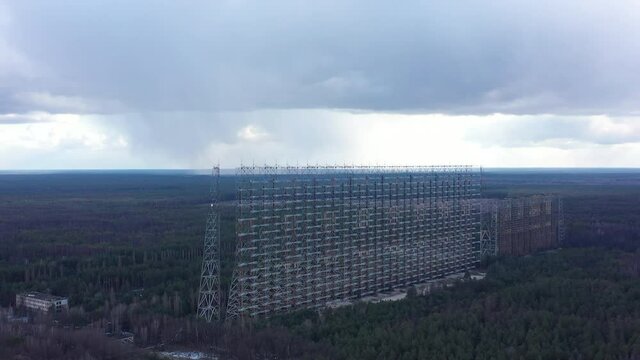 Aerial view of over the horizon radar stations DUGA. Soviet abandoned missile defence radar in the Chernobyl exclusion zone. Ukraine. Drone footage..Like in the HBO series Chernobyl