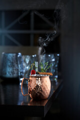 Coctail with raspberry in copper cup