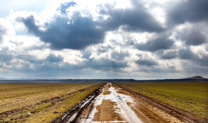 Lead clouds and the road leading to the horizon