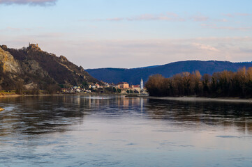 Dürnstein ruins on the Danube river from the distance at sunset