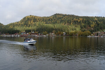 Fototapeta na wymiar Boat on Lake Teletskoye. Altai Republic. Western Siberia