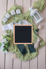 Mockup for announcement pregnancy . Space for text on textile background © Koroleva