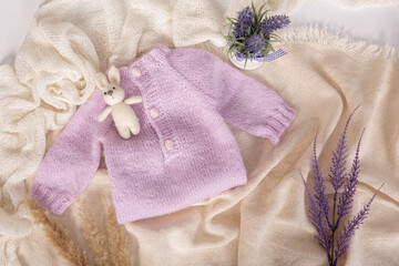 Mockup for announcement pregnancy . Space for text on textile background
