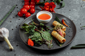 Spring rolls with shrimp with sweet chili sauce. Asian cuisine