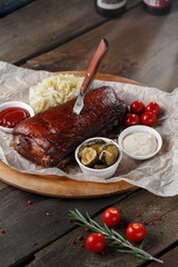 Beat steak on wooden table with tomatoes