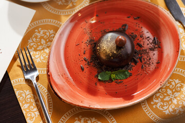 Chocolate dessert with mint leafs