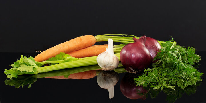 Carrots, celery, onion and garlic.The ingredients for an Italian Soffritto
