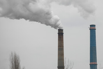 Chimney of a power station during a cold winter day in Bucharest.